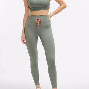 Peloton x Emma Lovewell Cadent Rib High Rise Pocket Legging (Dried Basil)